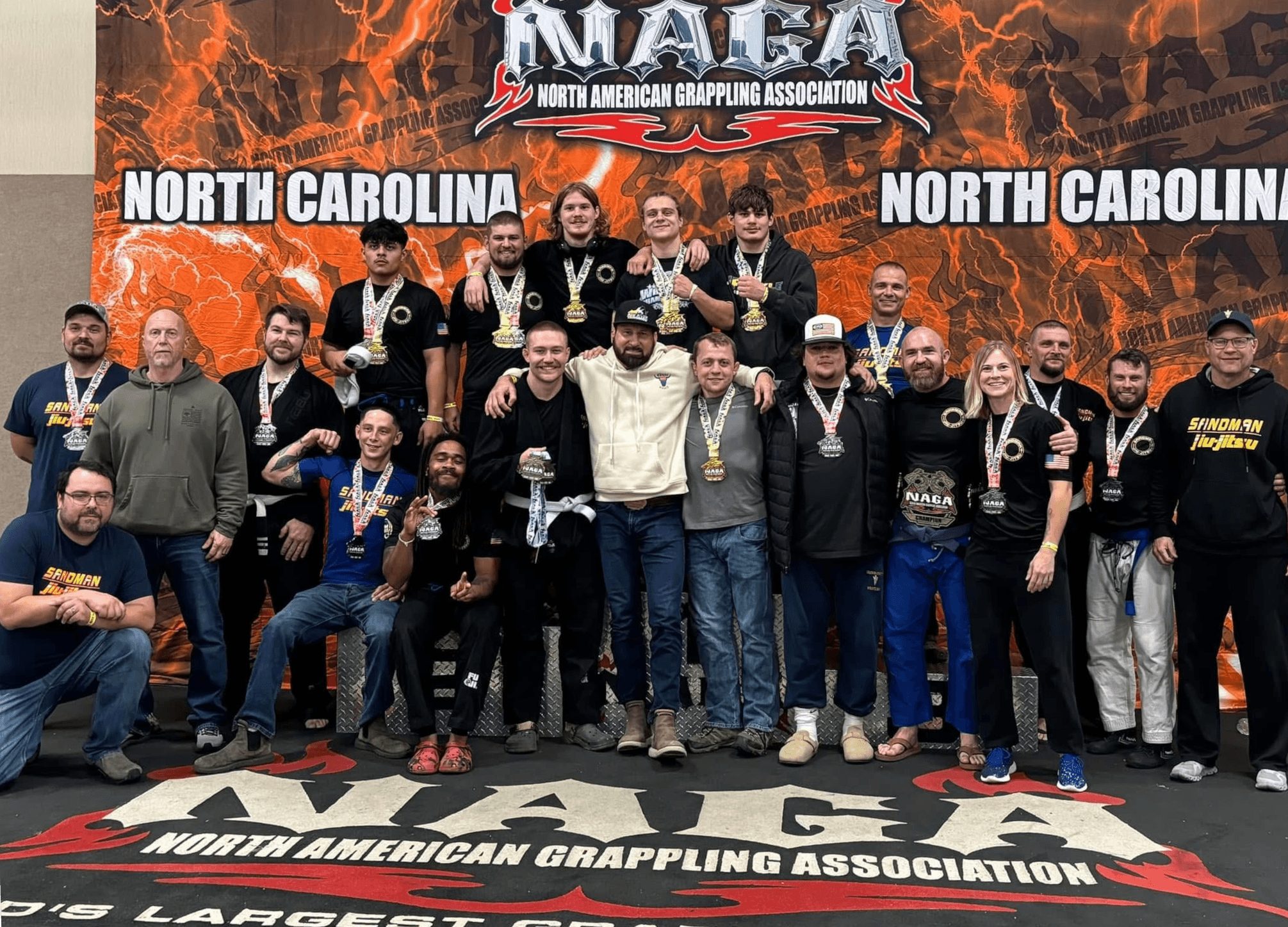 Sandman Jiu-Jitsu team with medals at the NAGA tournament in Hickory, 2024
